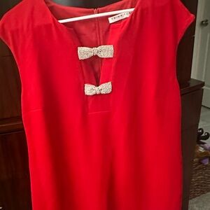 Women’s size 14 red Trina Turk cap sleeve red sheath dress.